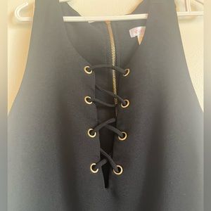 Xhilaration XS black romper, front pockets, gold zipper on back, slit on chest